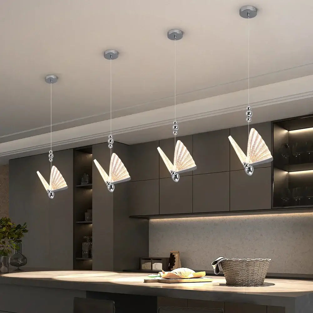 Modern silver butterfly led pendant light with metallic frames and translucent illuminated wings for living room decorbites butterfly led