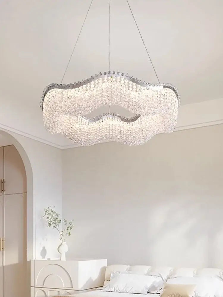 Modern silver crystal bead chandelier with cloud-shaped silver frame and cascading clear beads for bedroom decorbites crystal bead