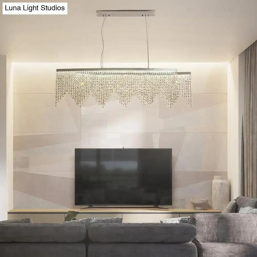 Modern silver crystal island pendant chandelier with cascading clear droplets from a metallic frame 220-240v inches wide