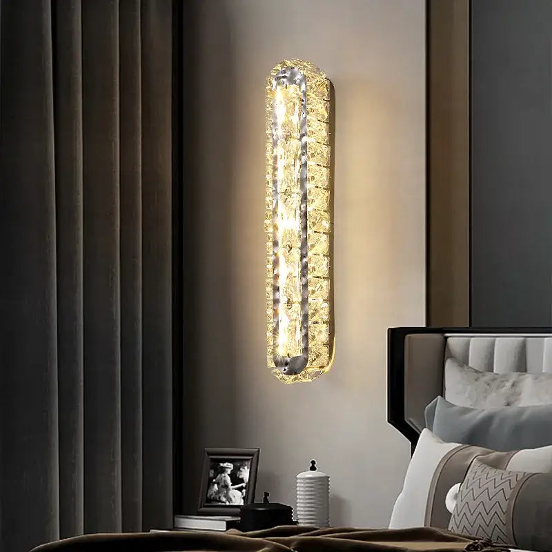 Modern silver crystal led wall lamp with textured crystal finish and warm lighting ideal for bedroom decorbites crystal led