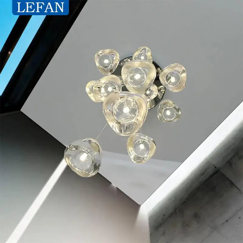 Modern silver crystal pendant light with clear glass bubble chandelier and cord pendant installation for dining room