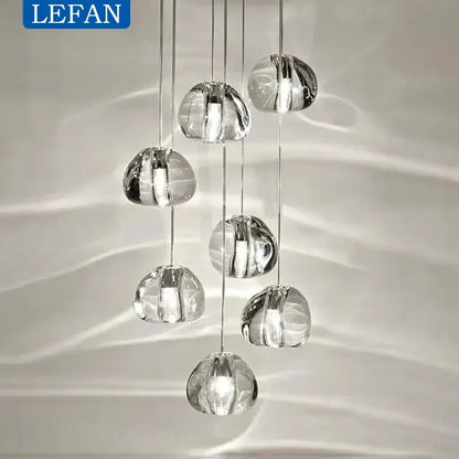 Modern silver crystal pendant light with clear faceted glass globe and cord pendant installation for dining room chandelier