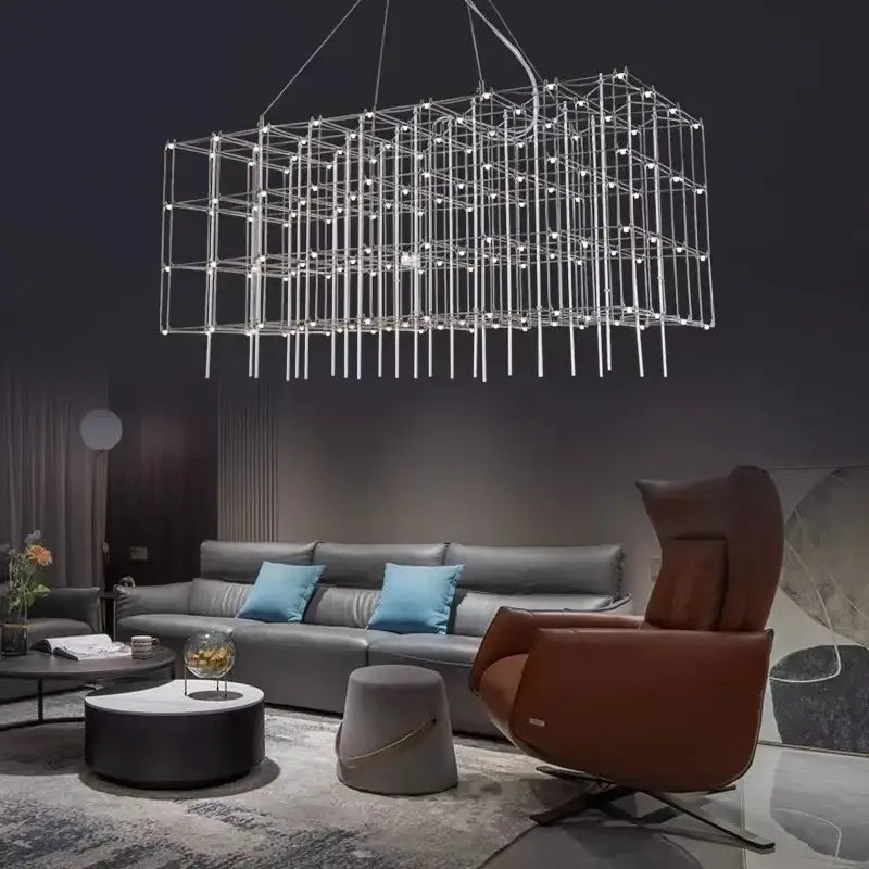 A modern silver decorbites cosmos chandelier with a metallic frame and embedded lights for dining room use
