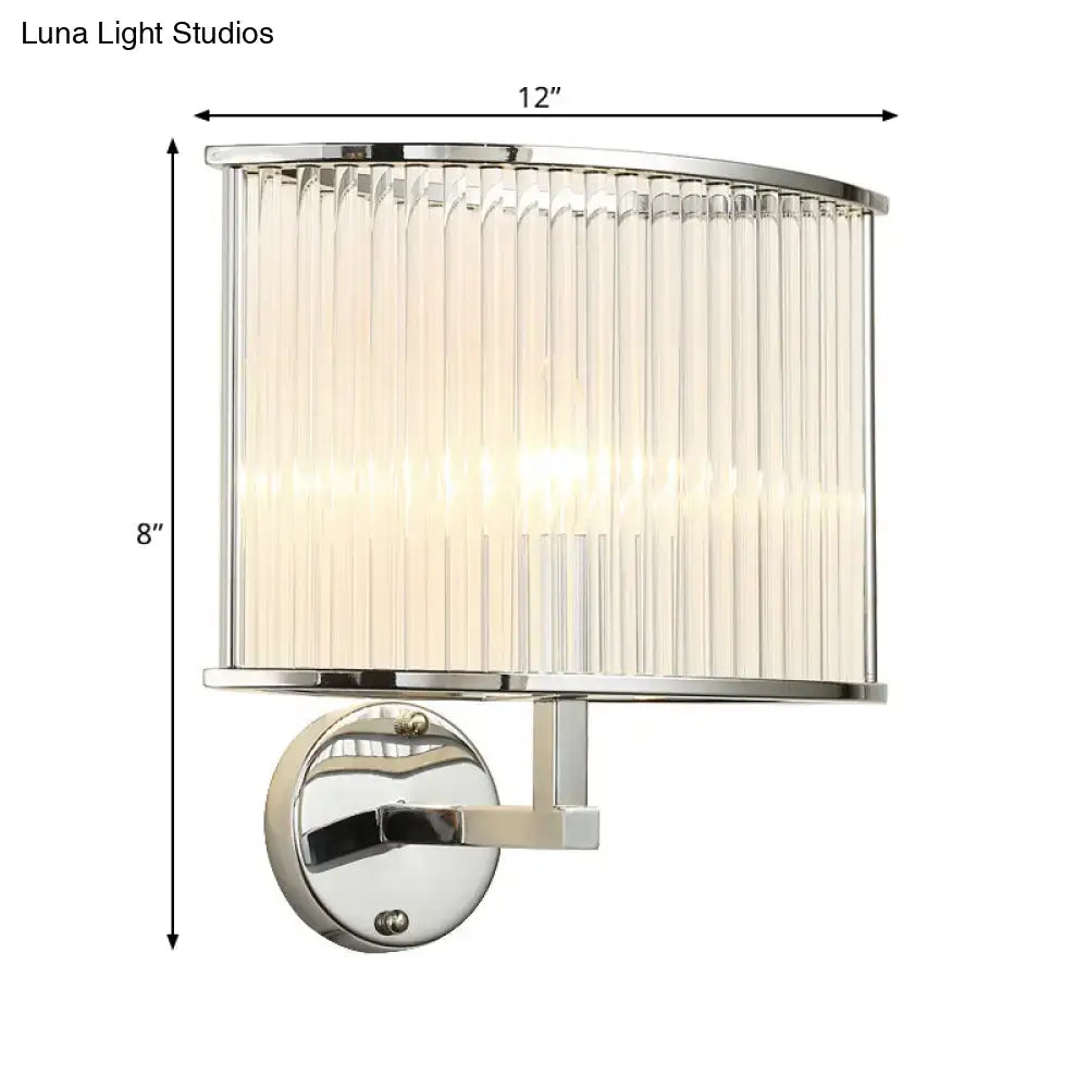 Modern wall lamp with silver finish and clear crystal curved ribbed glass shade for living room illumination
