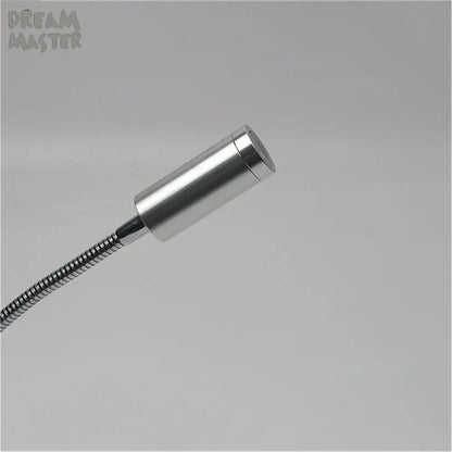 Modern silver cylindrical led wall lamp with flexible metallic gooseneck for bedroom reading sconce