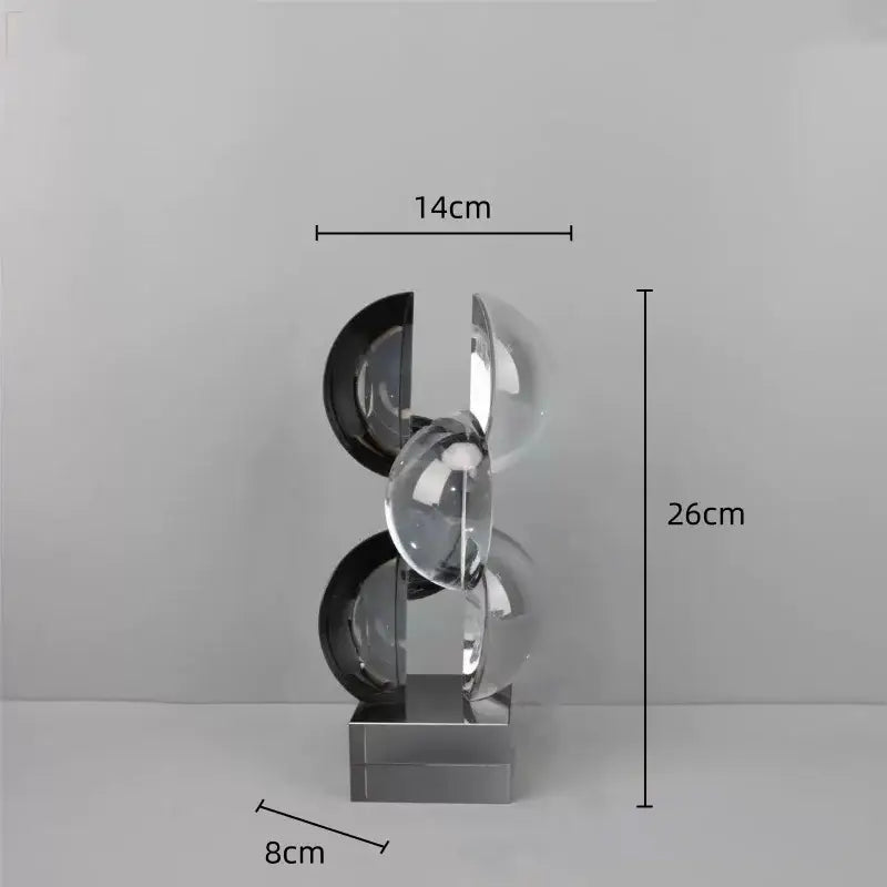 Modern silver geometric crystal sculpture with chrome finish and interlocking transparent black spheres for home decor