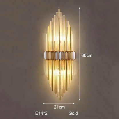 Gold-finished wall lamp with vertical glass rods and central mirrored bar decorbites crystal strip led bedroom sconce