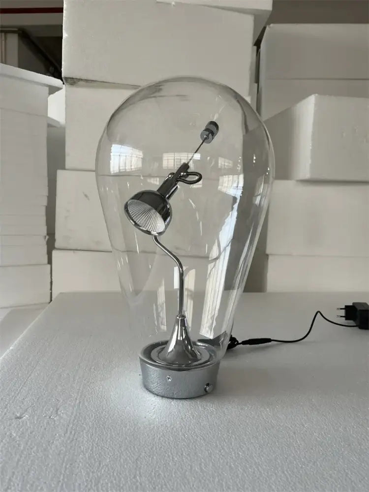 Modern silver glass desk lamp with a clear glass bulb shape and adjustable spotlight for vintage dimmable decorbites glass desk use