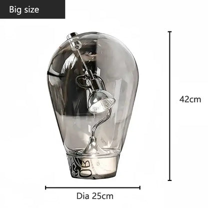 Modern silver glass desk lamp with adjustable spotlight featuring a sleek decorbites glass desk design for bedroom decor