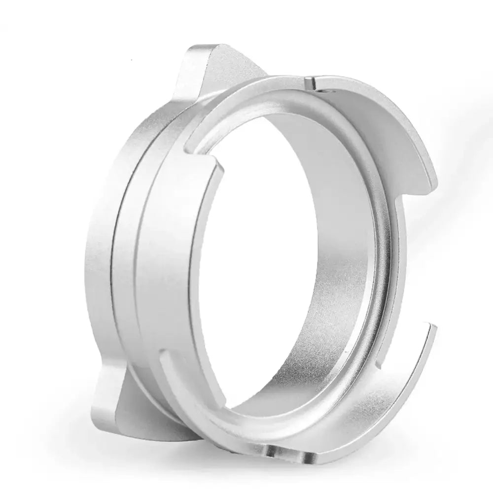 Modern silver machined coffee dosing funnel ring with a sleek metallic finish and angular cutouts for precise dosing
