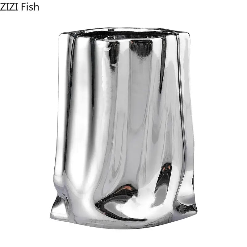 Shiny silver pleated texture ceramic vase with sculpted irregular body for modern living room decorbites gold plated style