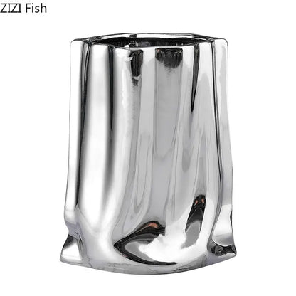 Shiny silver pleated texture ceramic vase with sculpted irregular body for modern living room decorbites gold plated style