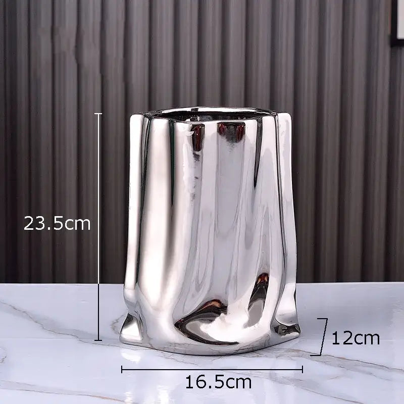 Modern silver pleated texture ceramic vase with shiny metallic sculpted body for living room decorbites gold plated style