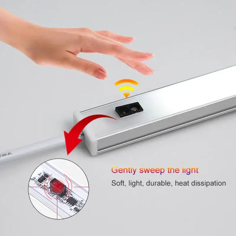 Modern silver aluminum rectangular led cabinet light with hand sweep switch and black motion sensor detail