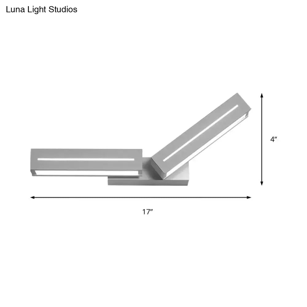 Modern silver rectangular led wall mounted light with two angled panels for bedroom sconce illumination