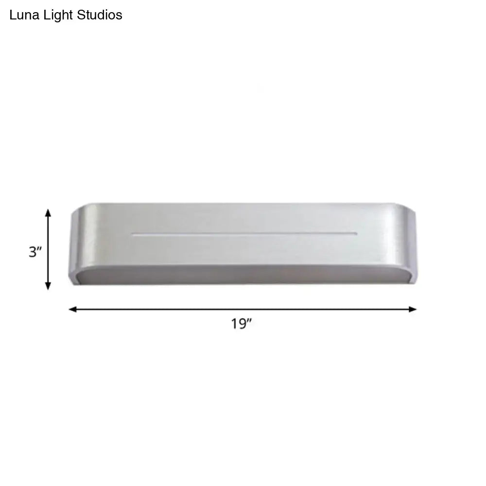 Modern silver rectangular led wall sconce with aluminum shade and brushed metal finish for bedroom lighting