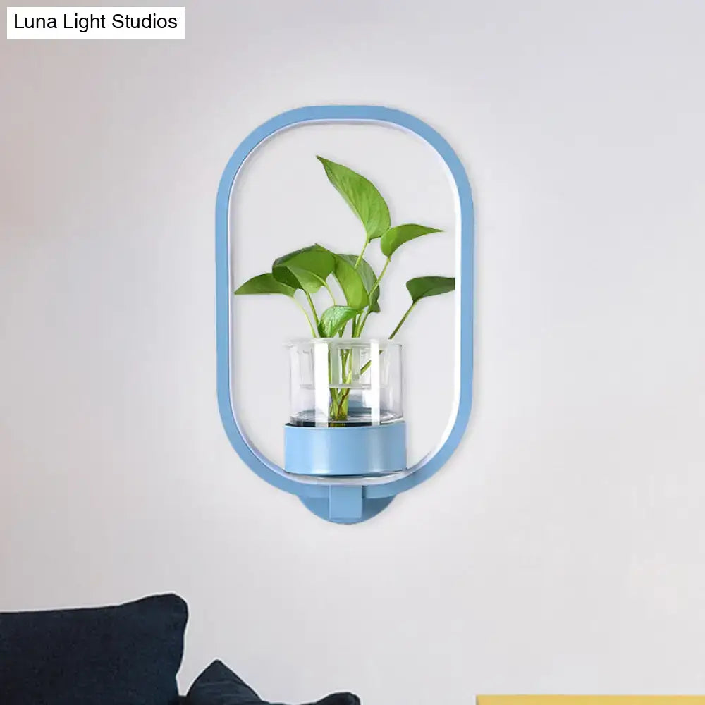 Modern silver wall light with light blue oval plant pot and clear glass water reservoir for bedroom 110v-120v use