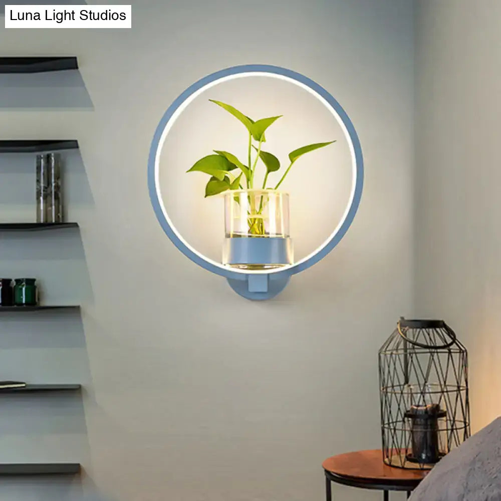 Modern silver wall light with blue circular plant pot and integrated led ring for 110v-120v bedroom use