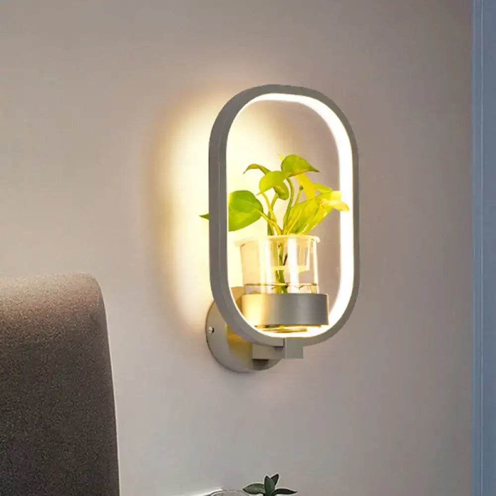 Modern silver wall light with sleek metallic frame 110v-120v plant pot and integrated led lighting for bedroom use