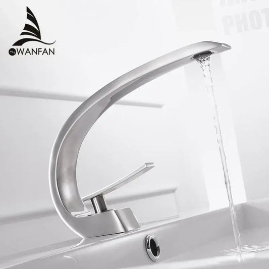 Modern silver decorbites basin faucet with a sleek curved design single-handle tap featuring a waterfall spout