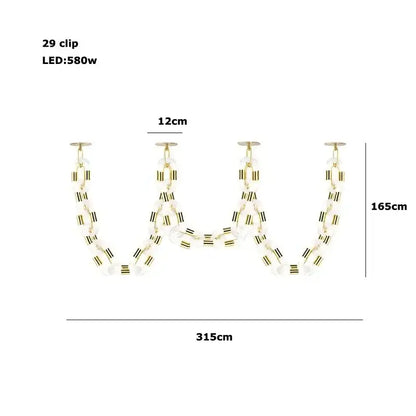 Modern silver and white crystal gold chain chandelier with 29 gold-toned clips and clear beads in a w-shape decorbites crystal gold