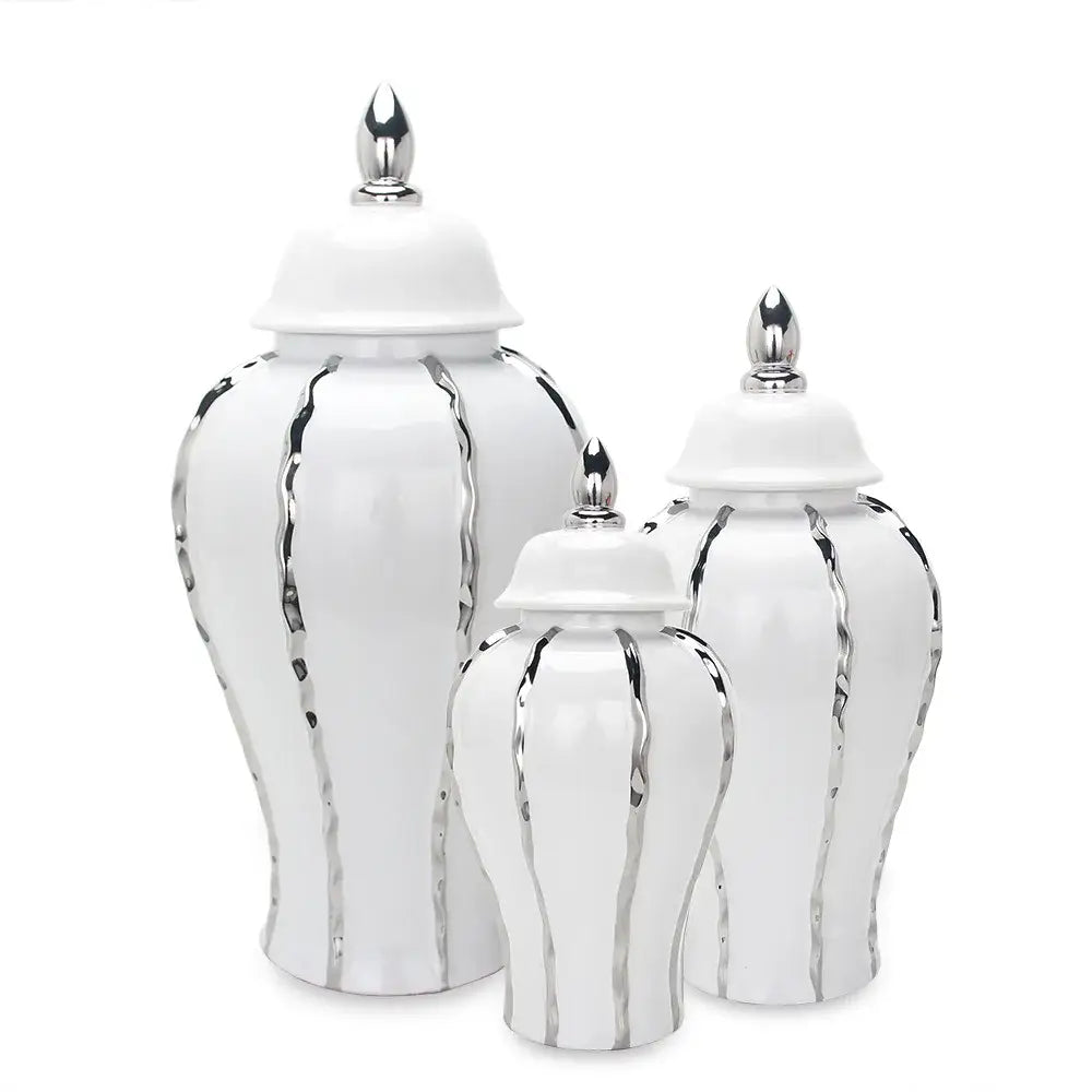 Set of three white ceramic ginger pot vases with silver metallic accents and matching lids for living room decor