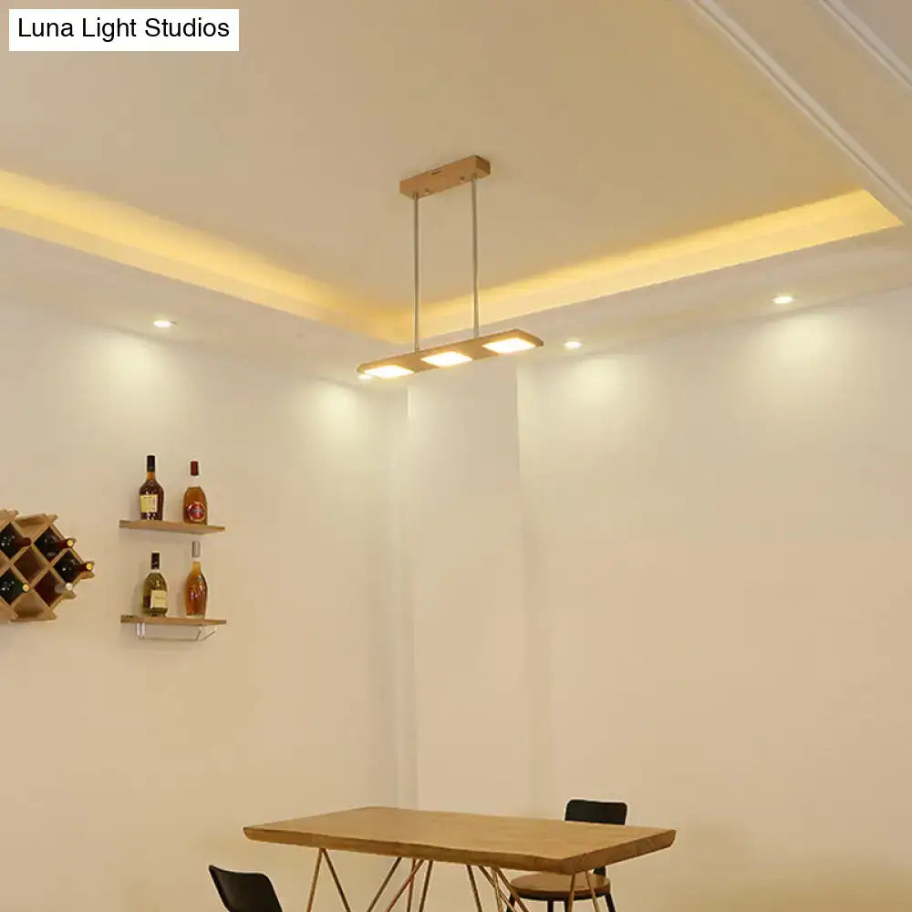 Modern simple rectangle wood island lamp with rectangular wooden frame and three warm led bulbs for dining room