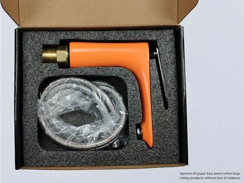 Orange plastic-handled spray gun with brass nozzle and stainless steel hose for decorbites basin faucet bathroom mixer tap