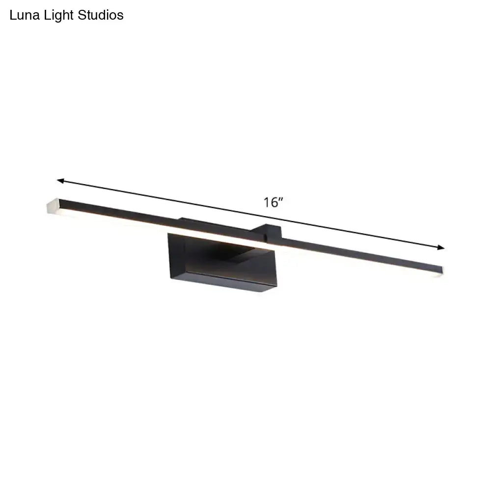 Black modern led wall light with sleek rectangular design 16 inch length emitting warm white light for bathroom use