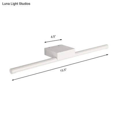 White rectangular wall-mounted light fixture with sleek modern design 15.5 by 4.5 inches emits warm light for bathroom use