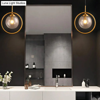 Gold-toned modern smoke gray clear glass globe pendant lights with circular metal frames for bathroom vanity 220v-240v 110v-120v