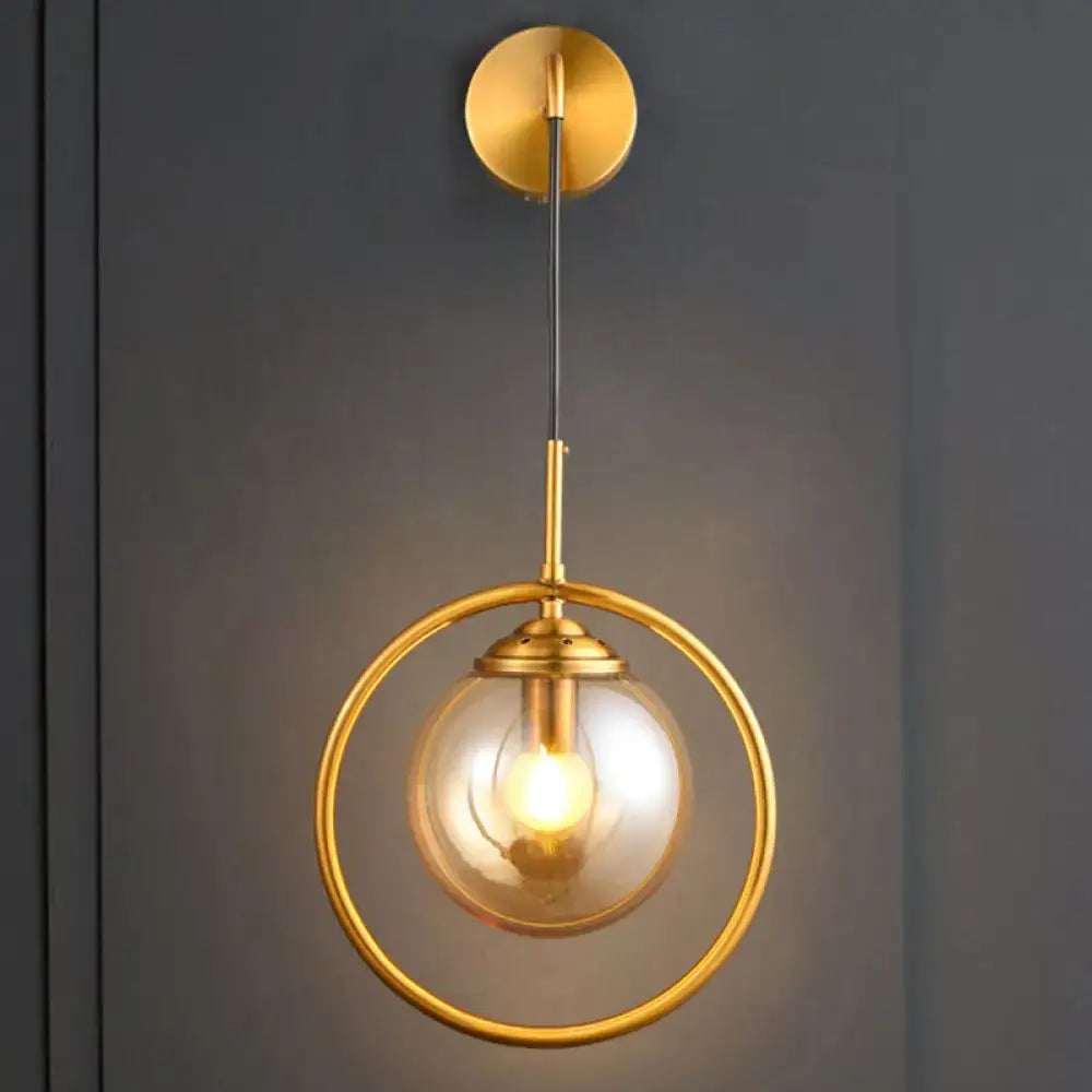 Modern smoke gray clear glass globe sconce with gold-toned spherical pendant and brass frame for bedroom wall light 220v-240v 110v-120v