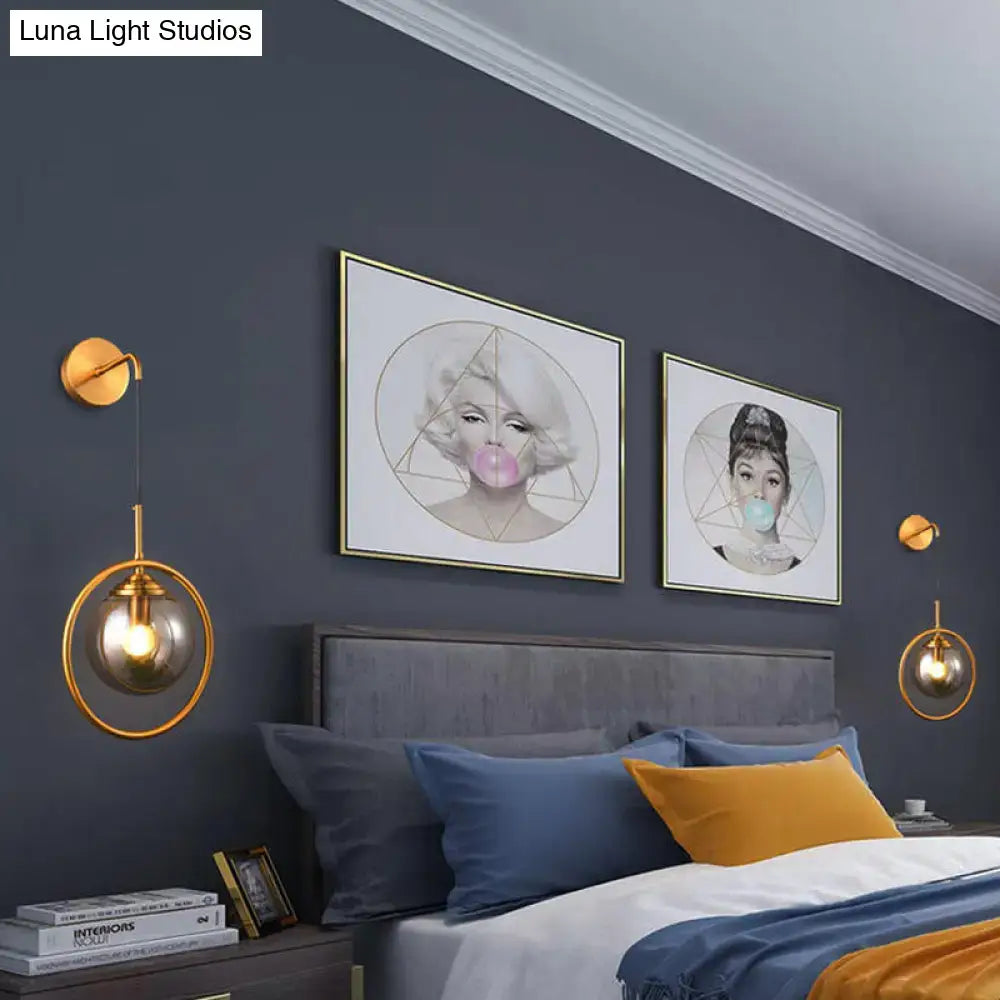 Gold-toned modern smoke gray clear glass globe sconce with hanging chain for bedroom wall light 220v-240v 110v-120v