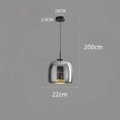 Modern smoked glass bowl chandelier pendant light with a metallic finish and transparent glass bowl for dining room use