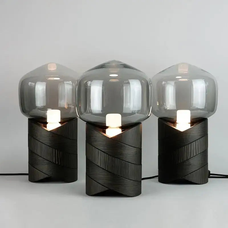 Three modern decorbites creative resin n823 lamps with smoked glass domes and textured black bases for bedroom table light