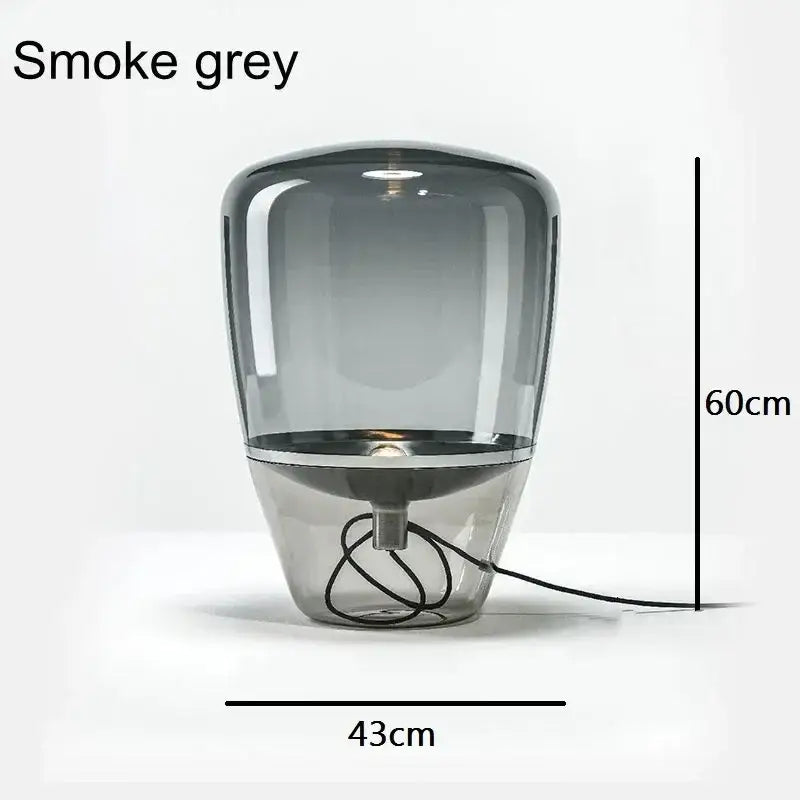 Smoke grey glass table lamp with sleek modern design and metallic base ideal as a bedroom led desk light