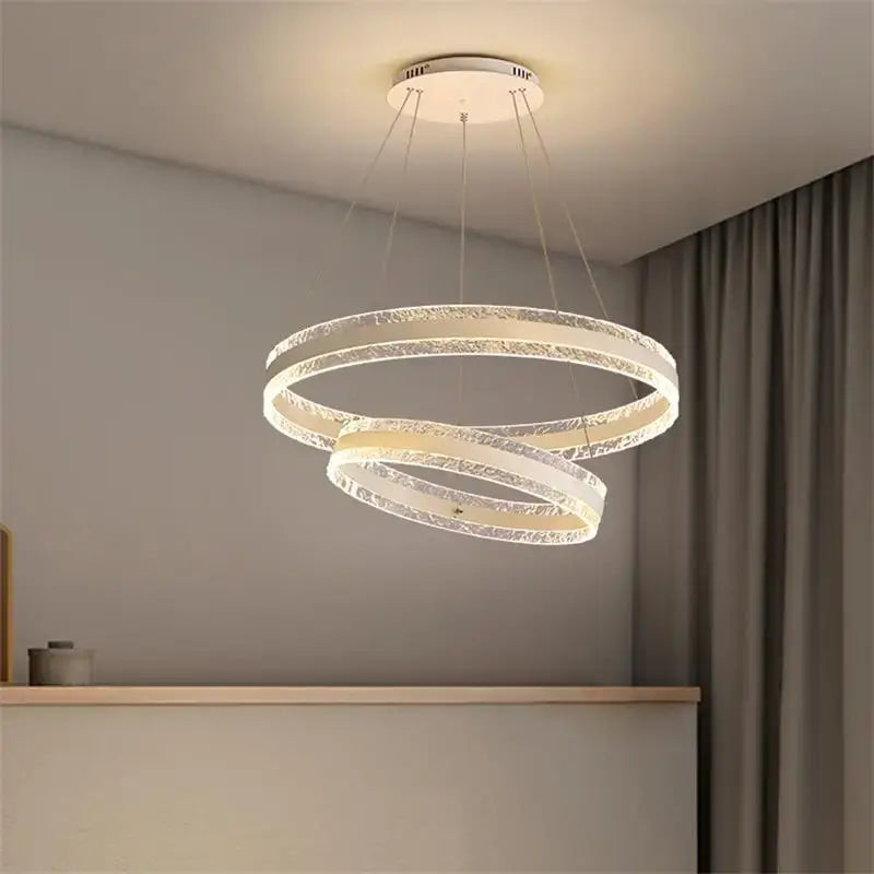 Modern spiral circle rings led chandelier featuring three crystal encrusted interlocking rings with warm white glow for living room decorbites circle rings