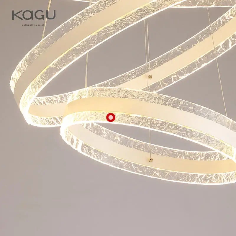 Modern spiral circle rings led chandelier with translucent textured rings emitting warm glow for living room decorbites circle rings
