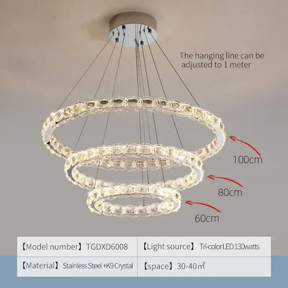 Modern spiral interlocking decorbites crystal chandelier with cascading crystal rings stainless steel frame tri-color led lighting