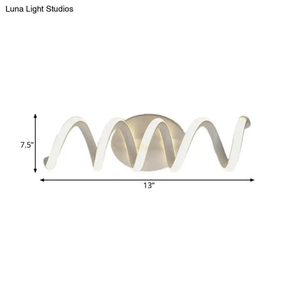 Modern spiral white wall light with natural warm led sconce and sleek wave-like design for bathroom use