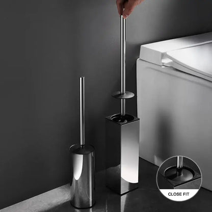 Shiny chrome-finished toilet brush set with sleek cylindrical handle and matching square base for modern bathroom use
