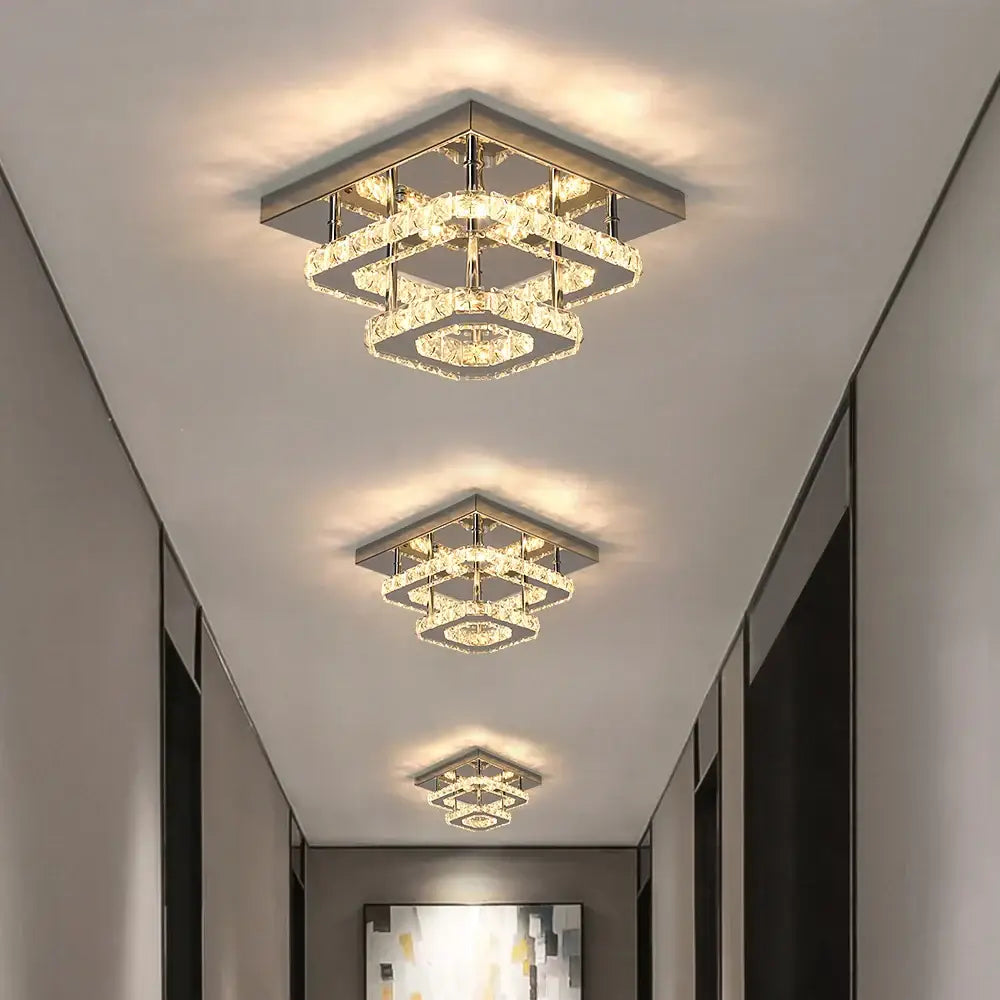 Modern square crystal flush mount ceiling light with layered crystal rings and sleek metallic frame for kitchen use