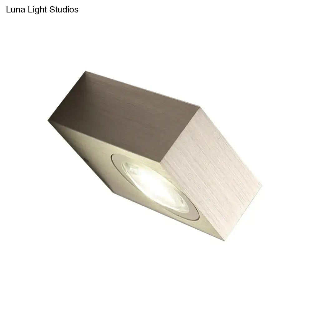 Modern square led bedroom wall light in black silver with brushed metallic rectangular recessed fixture and warm illumination