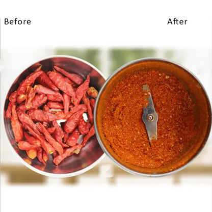 Modern stainless steel electric grinder with silver blade showing dried red chilies and ground red powder for grinding grains