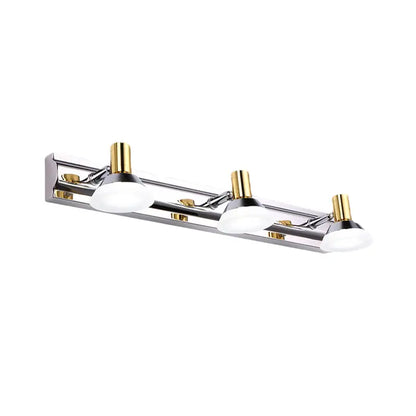 Modern stainless steel wall light with chrome and gold finish and acrylic cone shade for bathroom vanity lighting
