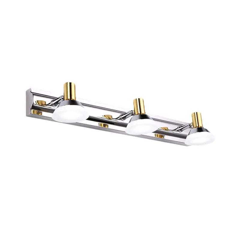 Modern stainless steel wall light with chrome and gold finish and acrylic cone shade for bathroom vanity lighting