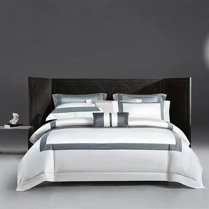 Elegant white satin bedding set with gray geometric trim and matching pillows for decorbites king size luxury use