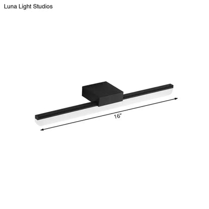 Black modern style led wall light with sleek rectangular design and 16-inch length emitting white light for bedrooms