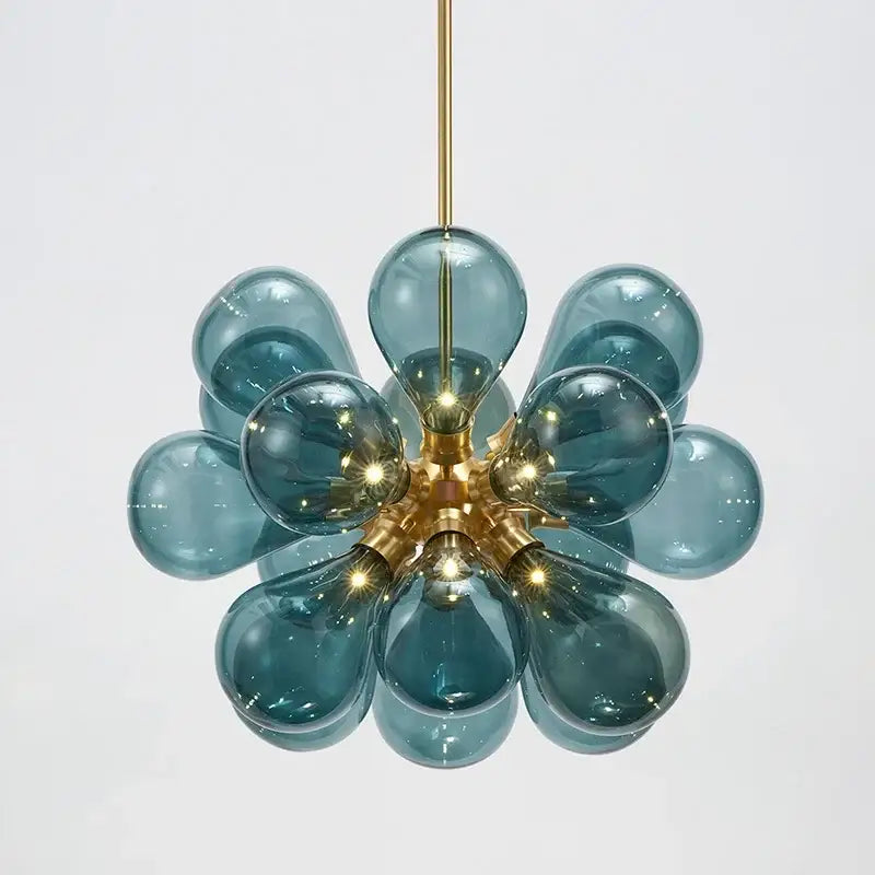 Modern teal and brass glass bubble chandelier pendant light with a brass hub and hanging chain for living room decorbites decor
