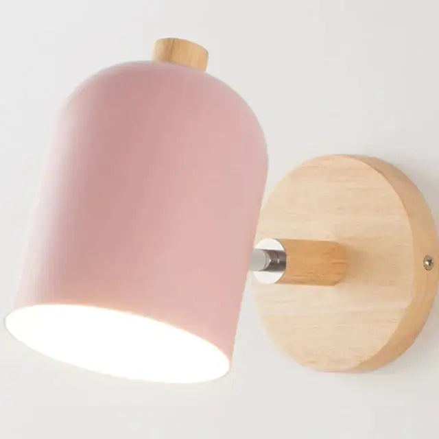 Pink cylindrical wall lamp with wooden base and mounting plate modern teal and wood bedroom sconce